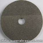 Electroplated diamond grinding pad 