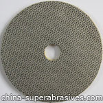 Electroplated diamond grinding pad 